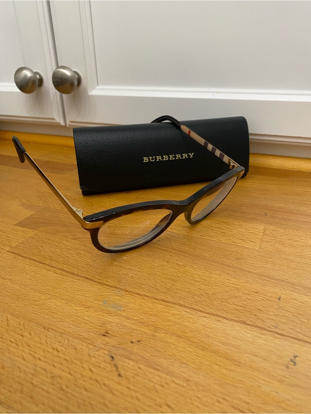Burberry Black and Brown Cat-Eye Glasses with Signature Check Temples